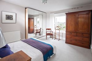 Bedroom One- click for photo gallery